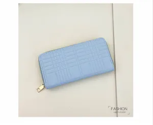 Close-up detail of the light blue long zippered wallet featuring neat stitching and metal zipper.