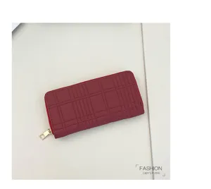 Red long zipper wallet featuring quilted grid pattern and multiple card slots.