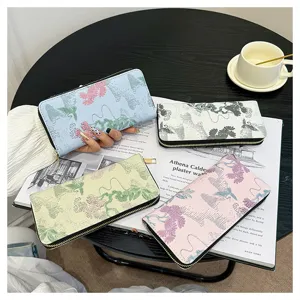 Portefeuille long femme tendance grande capacité avec fermeture éclair et design gaufré élégant
