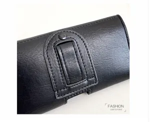 Nahaufnahme einer schwarzen Kunstleder Gürteltasche und Handyhülle mit Gürtelschlaufe.