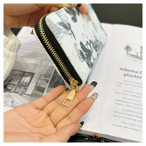 Portefeuille long zippé pour femme avec motif grue, grande capacité et détails de cartes.