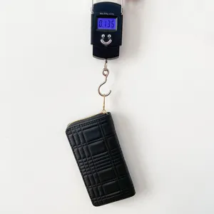 Fashion women black quilted long zipper wallet with large capacity and card slots.