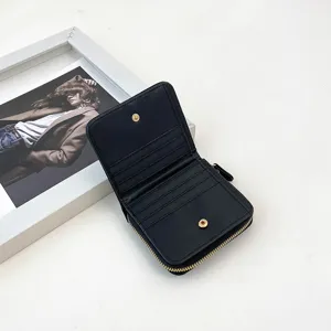 Portefeuille court minimaliste noir pour femmes, élégant porte-monnaie zippé avec fentes cartes.