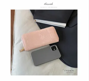 Pink snake pattern long zipper wallet for women, elegant daily clutch purse with card slots.
