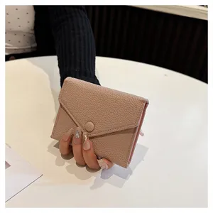 Porte-monnaie compact en cuir PU rose pour femmes, joli design court à trois volets.