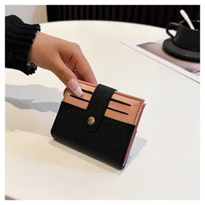 Mini portacarte minimalista da donna, portafoglio bicolore in pelle con bottone a pressione.