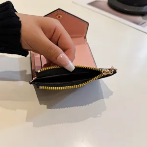 Mignon portefeuille pliant court en cuir PU style japonais pour femmes porte-monnaie.
