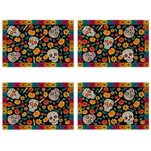 Halloween table placemat set featuring colorful sugar skulls and floral patterns for festive dining decor.