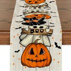 Halloween table runner detail showcasing spooky pumpkin, ghost and black cat printed design.