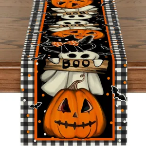 Halloween table runner with cute ghosts and pumpkins, black white buffalo plaid decor for party.
