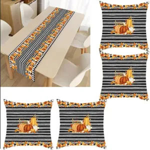 Thanksgiving table runner and pillow covers set with black white stripes and autumn pumpkin prints.