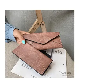 Vintage soft leather long wallet for women, elegant tri-fold large capacity purse.