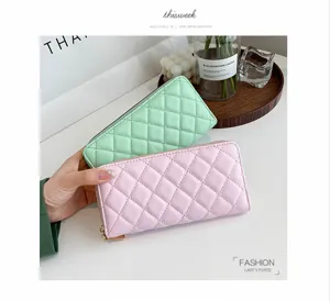 Portafoglio lungo trapuntato chic da donna con chiusura lampo, scomparti carte e grande capacità.