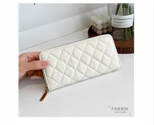 Portafoglio lungo trapuntato bianco da donna, con cerniera e scomparti per carte capiente.