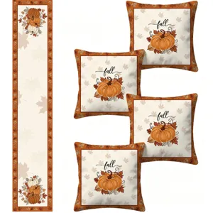 Close-up details of Thanksgiving fall autumn pumpkin cushion covers and matching table runner set.
