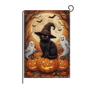 Halloween garden flag detail featuring cute black cat witch hat and glowing pumpkins.