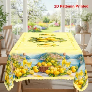 Detail de nappe motif citron mediterraneen avec bordure festonnee pour decoration table.