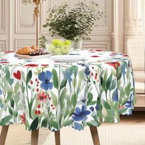 Vista detallada de mantel redondo con patrón floral rojo y azul para decoración de mesa.
