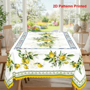 Vue détaillée de la nappe d'été à motif de citron avec bord ondulé pour la salle à manger.