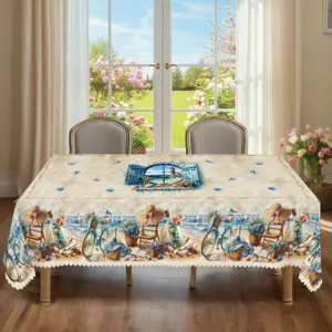 Vue détaillée de la nappe estivale sur le thème de la plage avec bordure en dentelle.