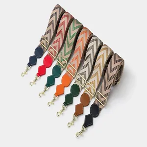 Adjustable wide replacement shoulder strap for crossbody bags with chic patterns.