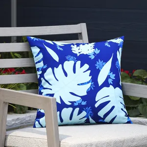 Outdoor waterproof tropical leaf pillow cover, blue monstera pattern cushion detail shot.