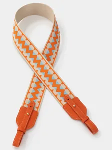 Replacement wide canvas shoulder strap with orange leather tabs and stylish zigzag pattern for bags.