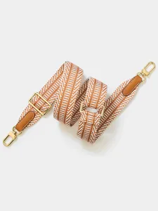Verstellbarer Ersatz-Taschenriemen mit braun-weißem Muster und goldfarbenen Metallbeschlägen.