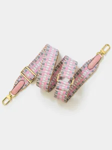 Bandoulière de sac tissée rose réglable avec des ferrures dorées et des bouts en cuir.