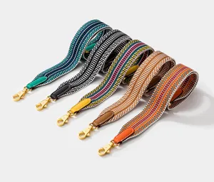 Colorful woven replacement bag straps with leather ends and gold metal clasps for bags.
