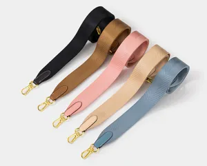 Correa de hombro ancha de nylon tejido universal de repuesto para bolsos de varios colores.