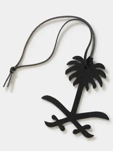 Black leather palm tree and crossed swords shape keychain and stylish bag charm pendant.