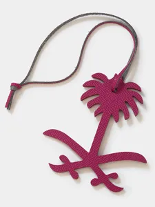 Leather palm tree charm pendant for luxury handbags and car keys stylish accessory.
