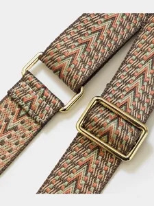 Replacement bag strap with tribal chevron pattern and gold metal hardware for purses.
