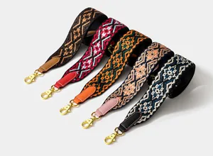 Woven wide replacement shoulder strap with ethnic geometric pattern and leather ends.