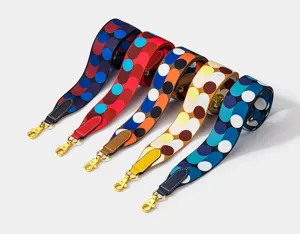 Colorful polka dot wide replacement bag strap with leather ends and gold metal hardware.