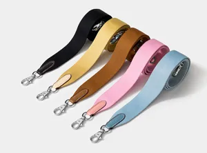 Colorful woven wide shoulder strap replacement for crossbody bags with metal clasps and leather.