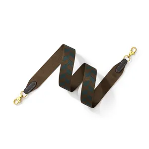 Stylish geometric jacquard replacement shoulder strap with gold hardware for handbags.