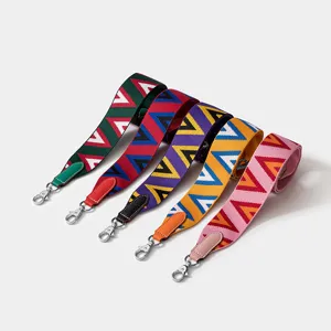 Bandoulière de sac large tissée style designer, sangle d'épaule géométrique colorée.