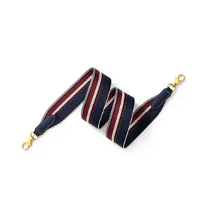Woven wide shoulder strap replacement for crossbody bags with striped design and gold clasps.