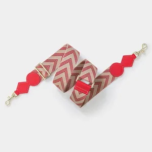 Adjustable wide replacement shoulder strap for crossbody bags with red and beige chevron design.