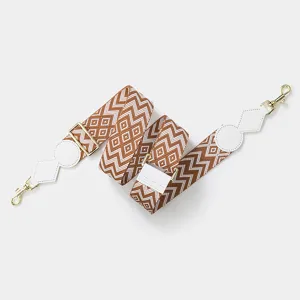 Stylish wide replacement bag strap with brown and white geometric pattern and gold hardware.