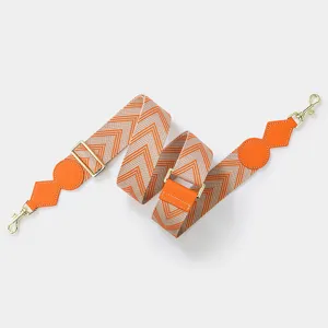 Adjustable wide replacement shoulder strap for crossbody bags with chic chevron woven pattern.