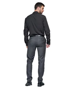 Back view detail of men's long-sleeve black business shirt paired with gray plaid dress pants.