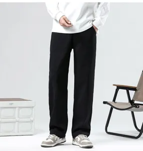 Mens casual loose straight fit denim jeans for spring and autumn, stylish wide leg long trousers.