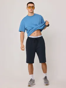 Lässige lockere gerade Herren Shorts Sommer Baumwolle Fünf-Viertel Hosen Detailansicht.