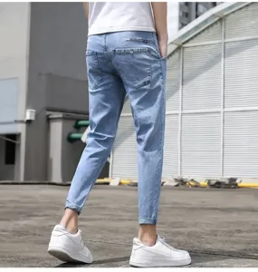 Men's light blue cropped slim fit stretch denim jeans, casual summer ankle length trousers.