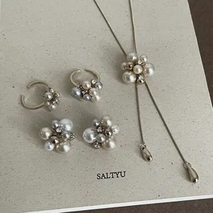 French light luxury pearl necklace earrings ring set coffee gold cluster jewelry design detail