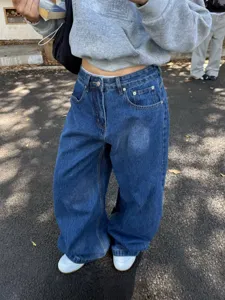 Men's dark blue washed loose straight-leg baggy denim jeans for casual daily street wear outfit.