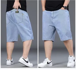 Mens light blue denim shorts, casual loose straight fit five-point trousers detail view.